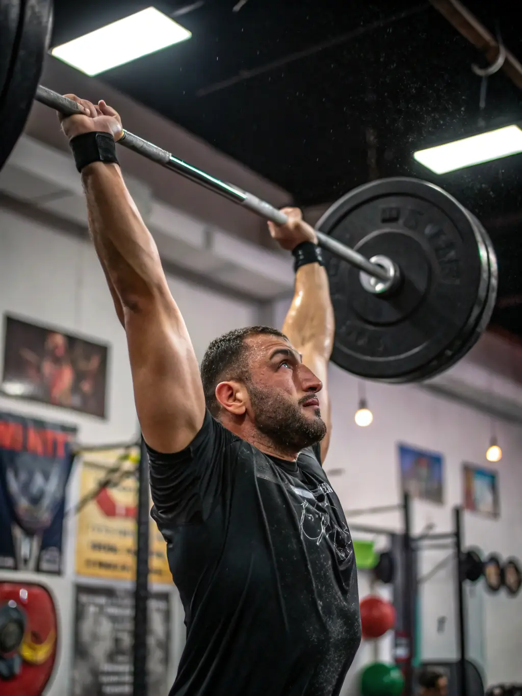 A person lifting weights in a gym, showcasing strength training as part of the Total Recharge program.